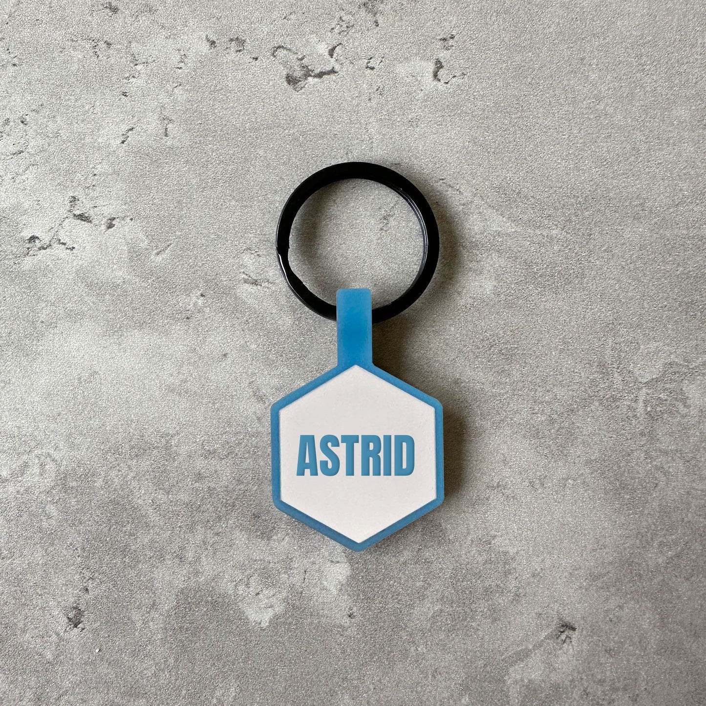 Light blue name tag for dog - Font Anton