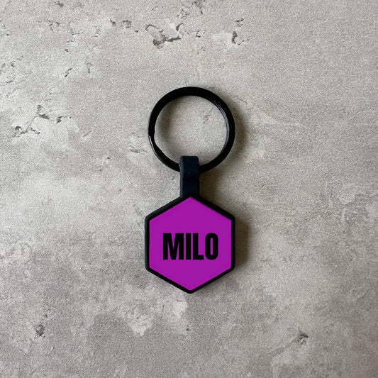 Dark purple name tag for dog - Font Anton