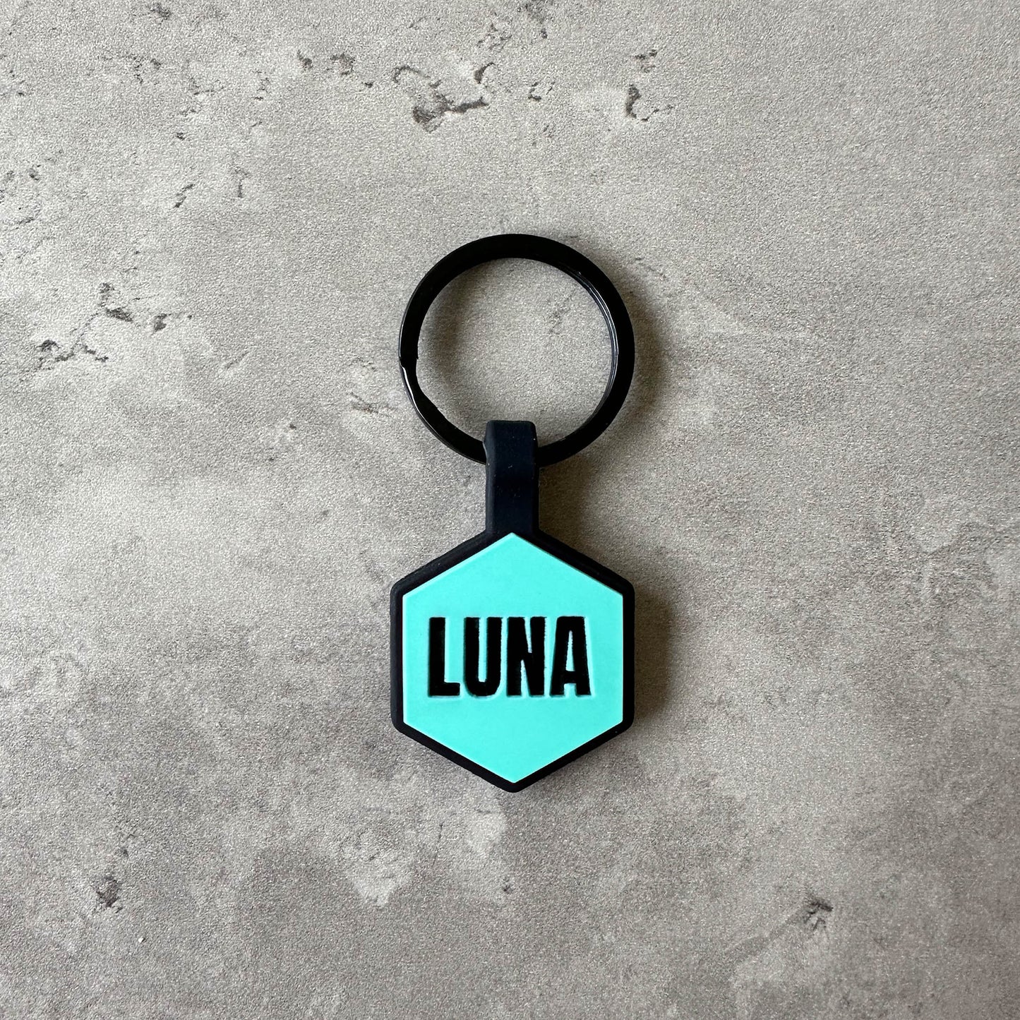 Turquoise name tag for dog - Font Anton